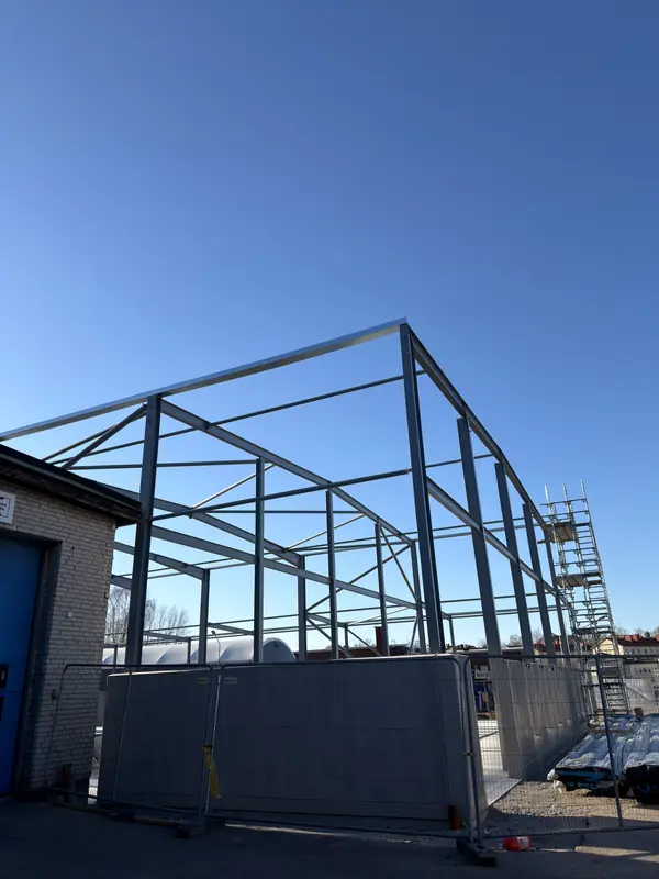 Existing steel frame before the SCS building-envelope works began