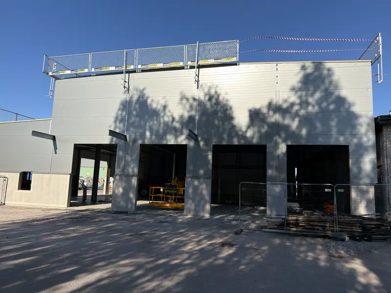 Main industrial garage façade after the SCS building-envelope works
