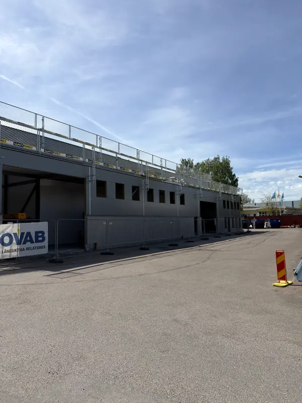 Long completed sandwich-panel elevation of the Jönköping workshop building