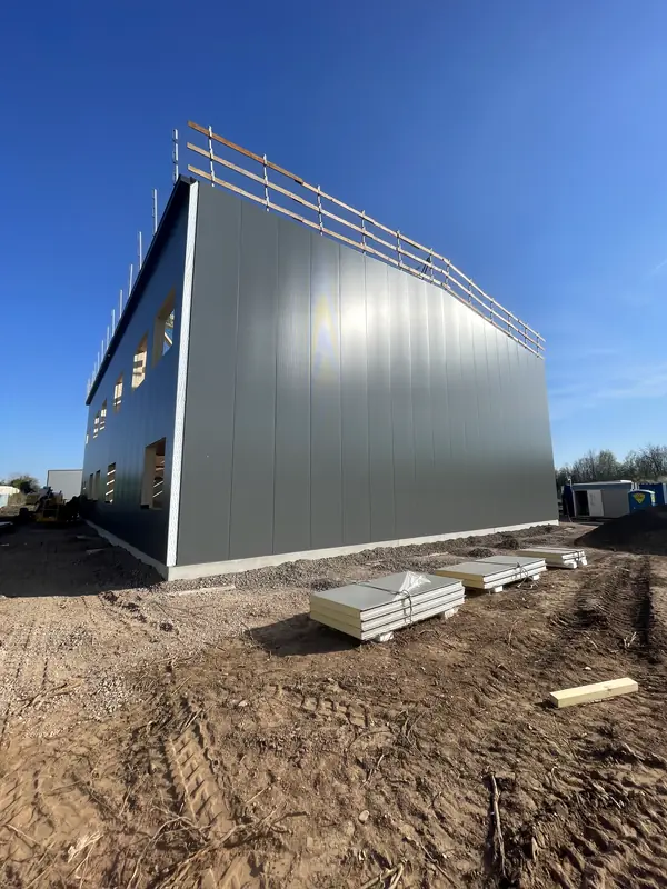 Gable elevation enclosed with anthracite sandwich panels