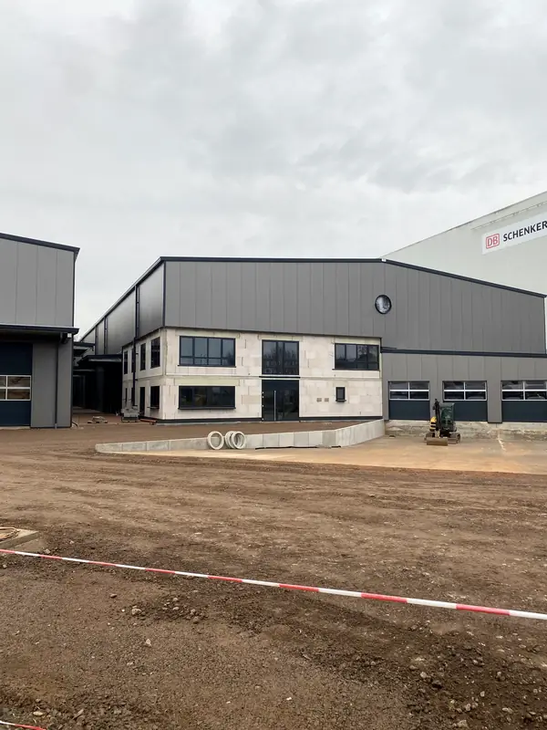 Completed warehouse front façade with doors and framed openings